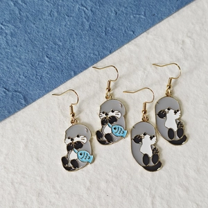Cute alloy sea otter drop earrings with 316 stainless steel hooks and enamel fish details