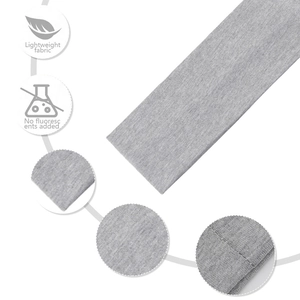 Détail macro du bandeau de sport en coton gris clair avec texture de tricot sans couture