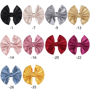 Multi-color satin bow hair clips set showing 10 vibrant silk fabric color options