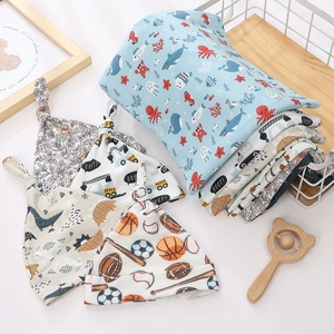 Newborn baby swaddle blanket and knotted hat set with various colorful cartoon prints