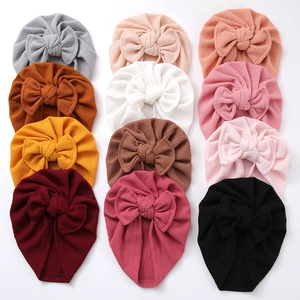 Bonnet Turbant pour Bébé en Tricot Gaufrette Avec Grand Nœud Chapeau Indien Extensible Doux Accessoires de Tête pour Nourrisson