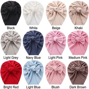 Newborn ribbed cotton turban hat with front knot detail available in 12 vibrant colors