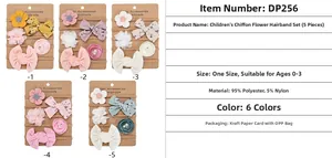 Close-up of five chiffon flower baby headbands with handmade bows and soft nylon bands