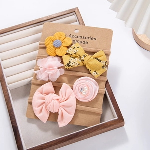 Detail of five-piece baby floral headband set with chiffon flowers on nylon bands