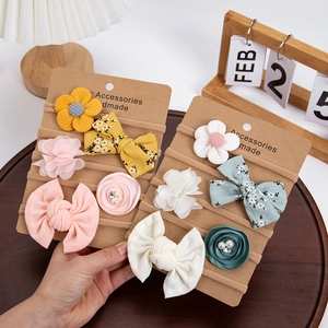 Detail of five-piece baby headband set with chiffon flowers and elastic nylon bands