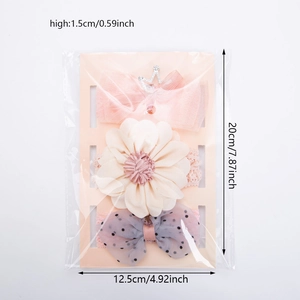 Detailed view of baby headband set with dimensions 20cm by 12.5cm in clear packaging