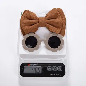 Toddler accessory set with waffle texture bow headband and flower frame sunglasses