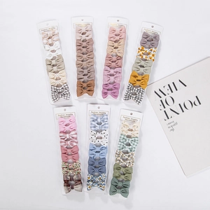 Ensemble de dix barrettes à cheveux en coton fait main avec motifs floraux pour bébé
