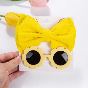 Bright yellow baby headband with waffle bow and sunflower sunglasses set in summer style