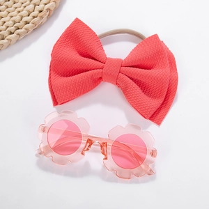 Kids flower sunglasses and coral pink bow headband set for summer travel fashion