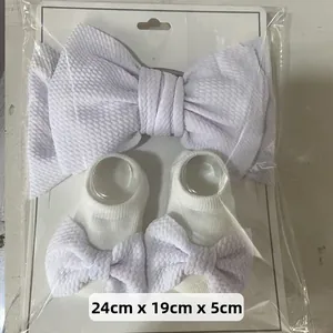 L24cm x W19cm x H5cm baby headband and socks set in package with waffle texture bow