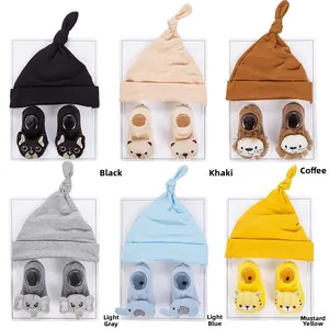 Baby knot beanie and animal socks set in six different colors on display cards