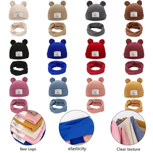 Detail view of 12 colors baby bear hat and scarf set with elastic fabric texture