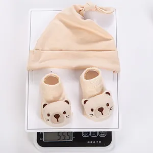 Beige ribbed knit baby turban hat and socks set with 3D plush bear detail weighing 55.5g