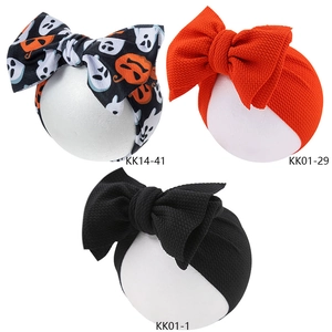 Three-pack set of baby headbands with large bows in Halloween prints and solid colors