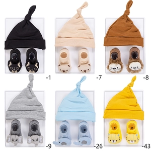 Cozy baby knit hat and socks set featuring cute animal 3D embroidery designs