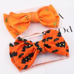 Halloween baby headbands with orange waffle fabric, pumpkin and bat bow designs