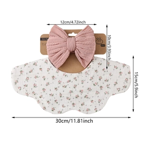 Pink floral cotton baby bib and bow headband set with precise product dimensions