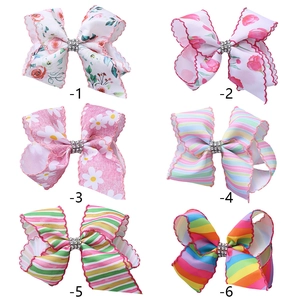 Barrettes à cheveux à grand nœud rayé arc-en-ciel avec bords fleuris et strass