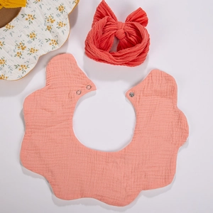 Cotton muslin baby bib and headband set with petal shape and ribbed bow in orange pink