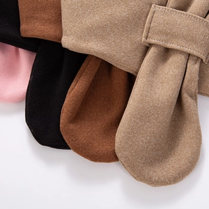 Detail view of textured knit scarf fabric showing four colors and reinforced stitching