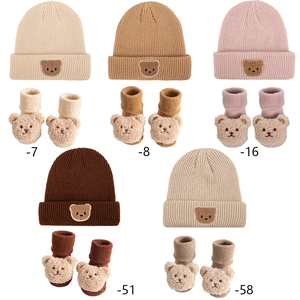 Cozy knit baby bear hat and sock set in five soft colors for autumn and winter warmth