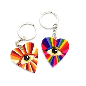 Rainbow Evil Eye heart keychains with artistic acrylic pendants in vibrant colors