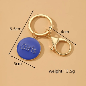 Detail view of Girls letter heart keychain with golden ring and 3cm blue charm