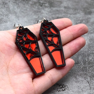 Gothic coffin earrings with red mirror finish and black spider web patterns for Halloween