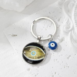 Artistic Evil Eye glass cabochon keychain with blue enamel bead and silver metal ring