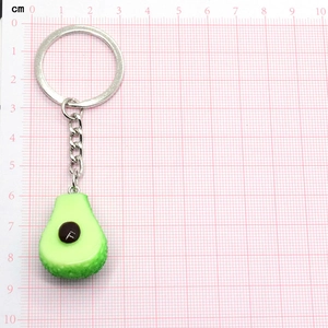 Creative avocado keychain with silver ring and green resin fruit pendant featuring F letter