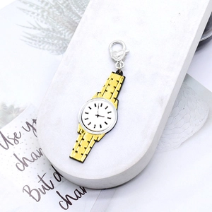 Detail of yellow enamel watch pendant with white dial and heart-shaped lobster clasp