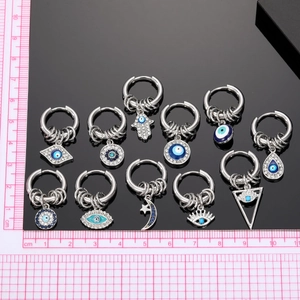 Set orecchini punk occhio del diavolo con smalto blu e dettagli in cristallo