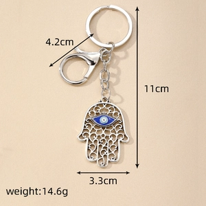 Vintage Hamsa Hand keychain with blue evil eye pendant and lobster clasp for bag decoration