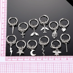 Set of 12 vintage punk stainless steel hoop earrings with star, moon, and heart pendants