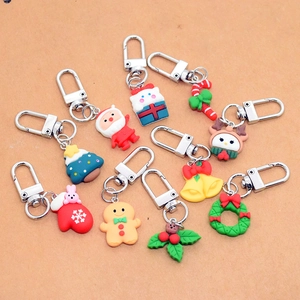 Set of 10 festive Christmas resin keychains with cartoon reindeer and ginger man