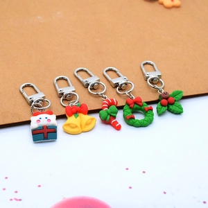 Christmas resin keychain set with Santa cat bell candy cane and wreath charms