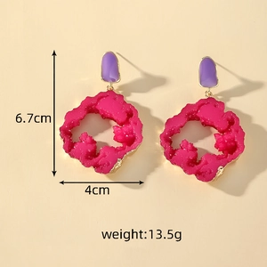 Detailed size view of irregular resin drop earrings with purple and pink stone texture