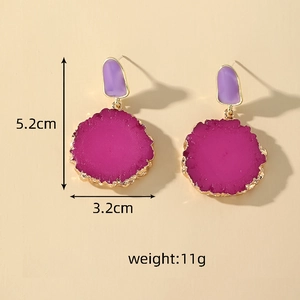 Detailed view of resin drop earrings showing 5.2cm length and 3.2cm width dimensions