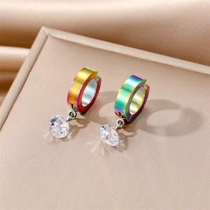 Macro shot of rainbow gradient metal hoop earrings with clear round cubic zirconia drops