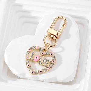 Golden heart LOVE keychain with sparkling rhinestones and pink evil eye charm pendant