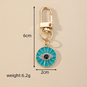 Detail view of Evil Eye heart keychain with dimensions 6cm length and 2cm pendant width