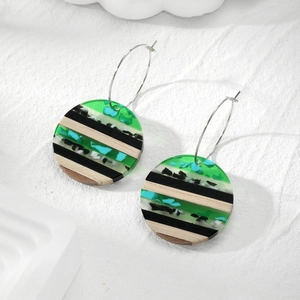 Retro geometric earrings with colorful resin and wood patchwork pendants in round shape