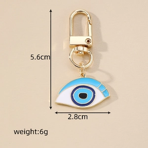 Size dimensions and weight detail of the blue evil eye heart keychain with crystal