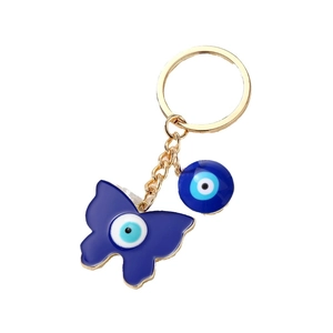 Porte-clés papillon œil bleu avec alliage doré et breloques en émail pour porte-bonheur