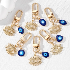 Porte-clés Boho en Alliage Mauvais Œil Avec Pendentif Cils Creux Émail Bleu Main de Fatma Cœur Nazar Protection Anneau de Clé