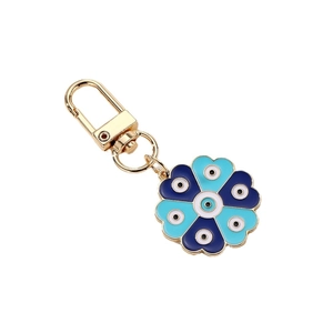 Exquisite gold-tone evil eye heart keychain with blue enamel petals and crystal accents