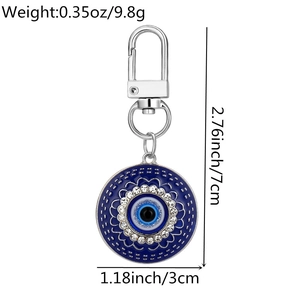 Detail view of Evil Eye keychain with measurements showing 3cm diameter and 7cm length