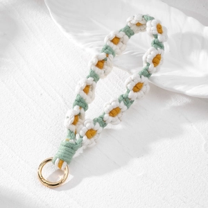 Handmade woven daisy flower keychain and bag charm in fresh bohemian style