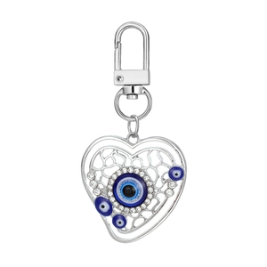 Silver alloy hollow heart evil eye keychain set with white zircons and blue nazar beads